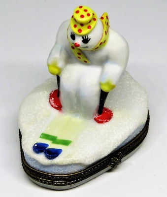 LIMOGES BOX - CHRISTMAS - SNOWMAN/SNOWLADY WITH SCARF & HAT SKIING TO NORTH POLE
