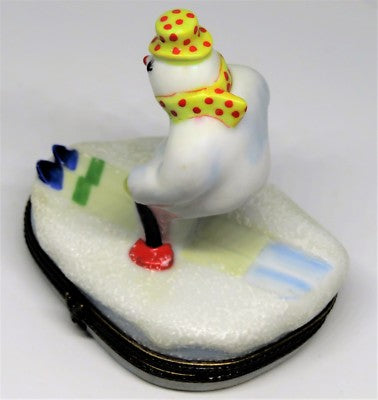 LIMOGES BOX - CHRISTMAS - SNOWMAN/SNOWLADY WITH SCARF & HAT SKIING TO NORTH POLE