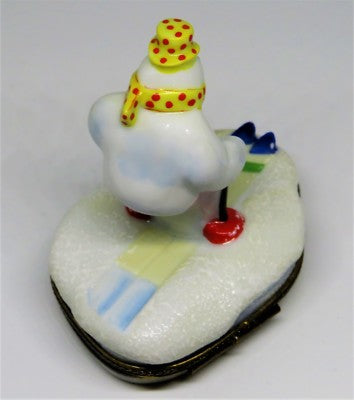 LIMOGES BOX - CHRISTMAS - SNOWMAN/SNOWLADY WITH SCARF & HAT SKIING TO NORTH POLE