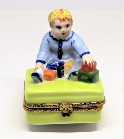 LIMOGES FRANCE BOX - ARTORIA - BABY BOY PLAYING WITH ALPHABET BLOCKS - LE NO 55