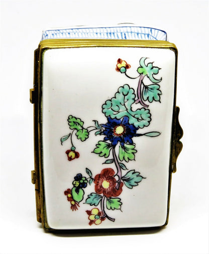 LIMOGES BOX - CHANTILLY - ANTIQUE COUPLE IN A FLORAL BED - FLOWERS & BEETLE