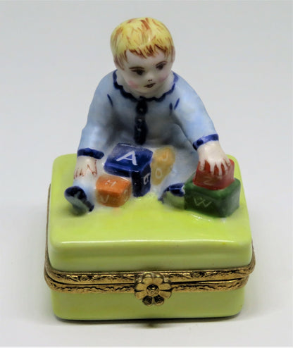 LIMOGES FRANCE BOX - ARTORIA - BABY BOY PLAYING WITH ALPHABET BLOCKS - LE NO 55