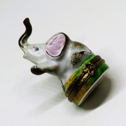 LIMOGES BOX- GERARD RIBIERRE - TINY AFRICAN ELEPHANT - TRUNK UP - LEAF CLASP -GR