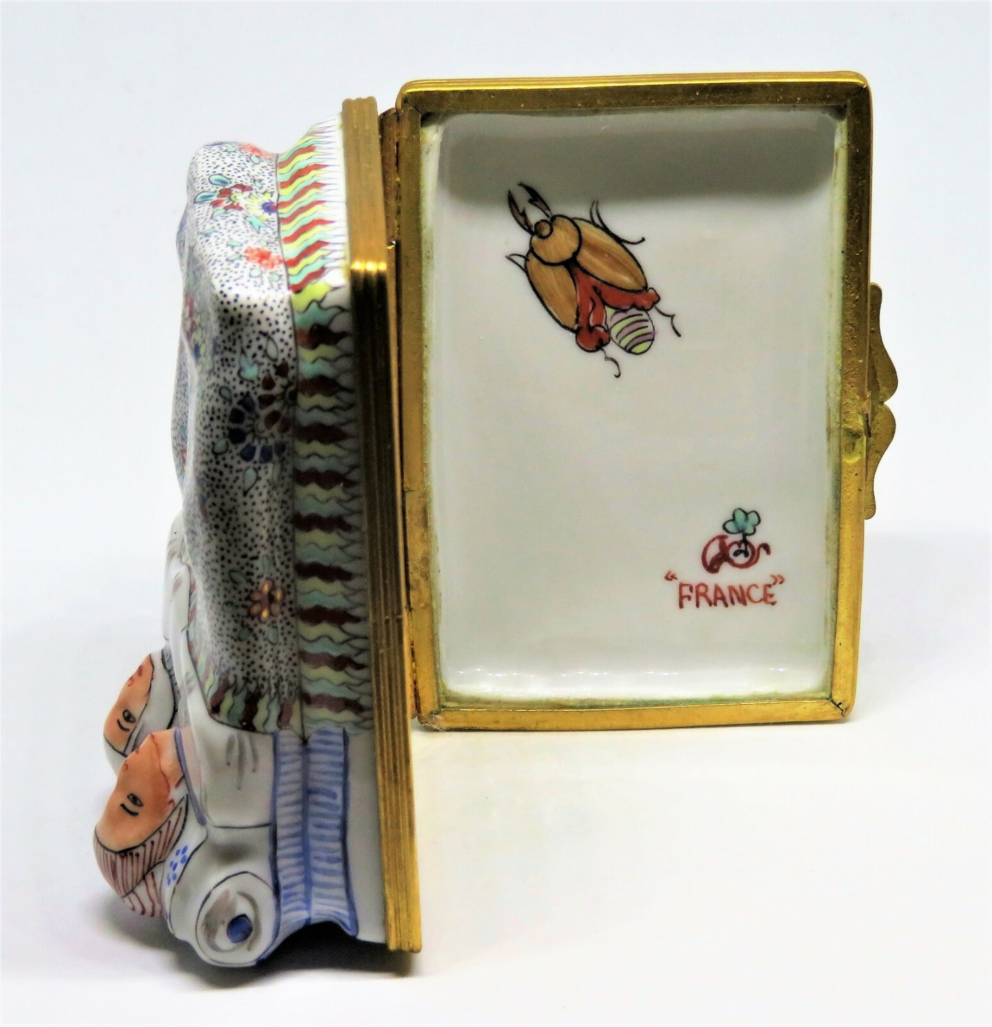 LIMOGES BOX - CHANTILLY - ANTIQUE COUPLE IN A FLORAL BED - FLOWERS & BEETLE