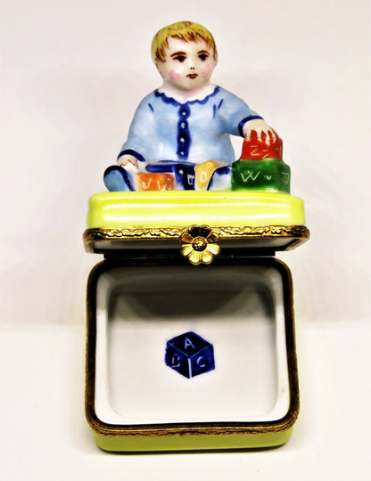 LIMOGES FRANCE BOX - ARTORIA - BABY BOY PLAYING WITH ALPHABET BLOCKS - LE NO 55