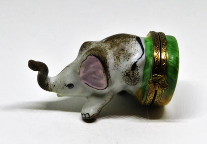 LIMOGES BOX- GERARD RIBIERRE - TINY AFRICAN ELEPHANT - TRUNK UP - LEAF CLASP -GR