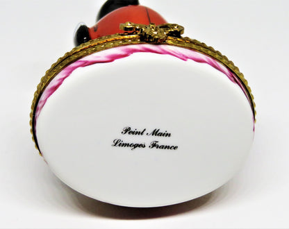 LIMOGES BOX- CHRISTMAS - WHIMSICAL PENGUIN IN A SANTA CLAUS SUIT - SACK OF GIFTS