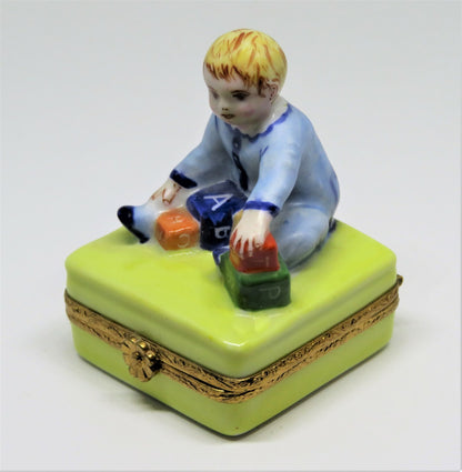 LIMOGES FRANCE BOX - ARTORIA - BABY BOY PLAYING WITH ALPHABET BLOCKS - LE NO 55