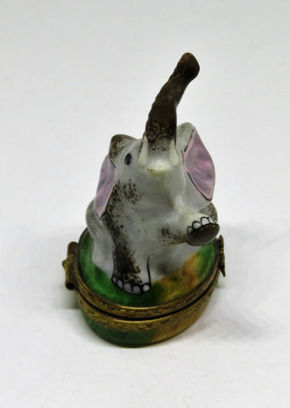 LIMOGES BOX- GERARD RIBIERRE - TINY AFRICAN ELEPHANT - TRUNK UP - LEAF CLASP -GR