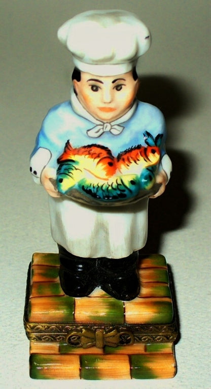 LIMOGES BOX -ELDA- FRENCH CHEF WITH A PLATTER OF FISH - GUY BUFFET STYLE