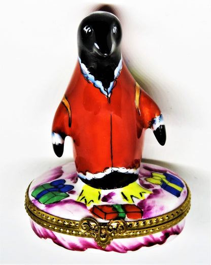 LIMOGES BOX- CHRISTMAS - WHIMSICAL PENGUIN IN A SANTA CLAUS SUIT - SACK OF GIFTS